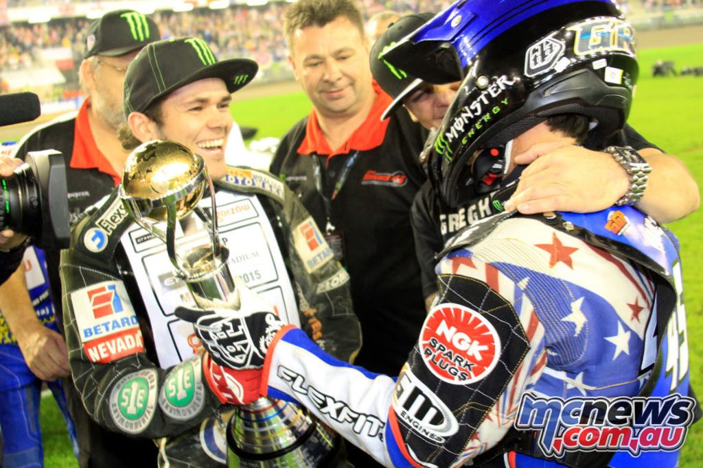 Hancock handed the trophy by Tai Woffinden in 2014 - Image by Jarek Pabijan