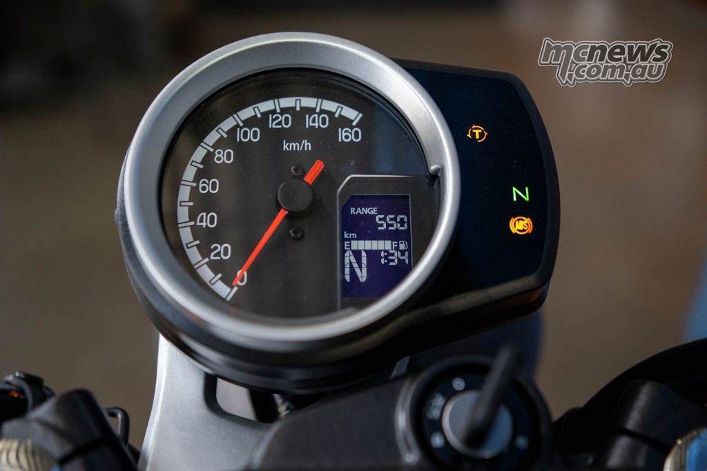 The simple LCD dash with analogue speedo combined old and new