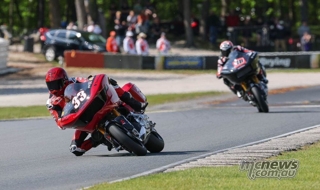 Kyle Wyman had his hands full with teammate Bradley Smith in the closing laps of Saturday's Mission King Of The Baggers race at Road America. Wyman led a Harley-Davidson factory sweep of the top three. Photo by Brian J. Nelson
