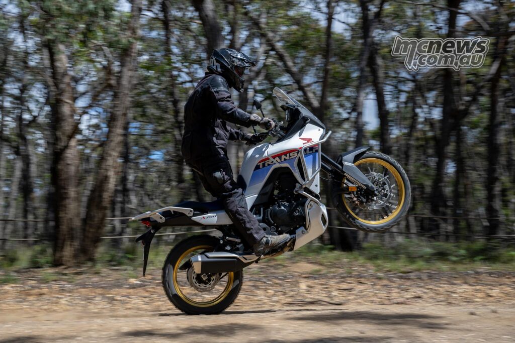 Wayne pulling a wheelie on the 2025 Honda Transalp