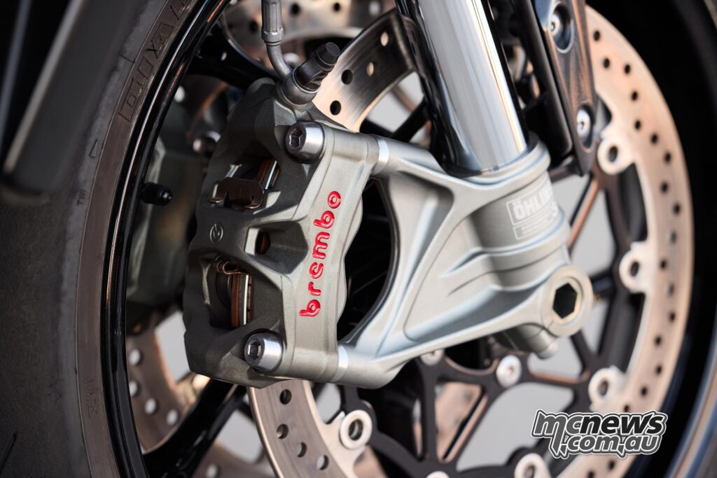 Big 320 mm rotors are run and a Brembo master-cylinder