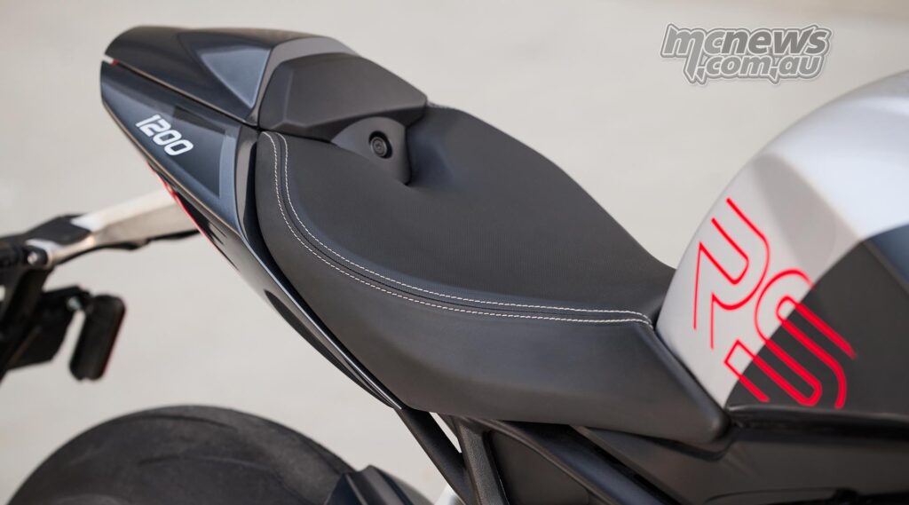The Speed Triple RS's seat sits at 823 mm but features a fairly dense/hard foam
