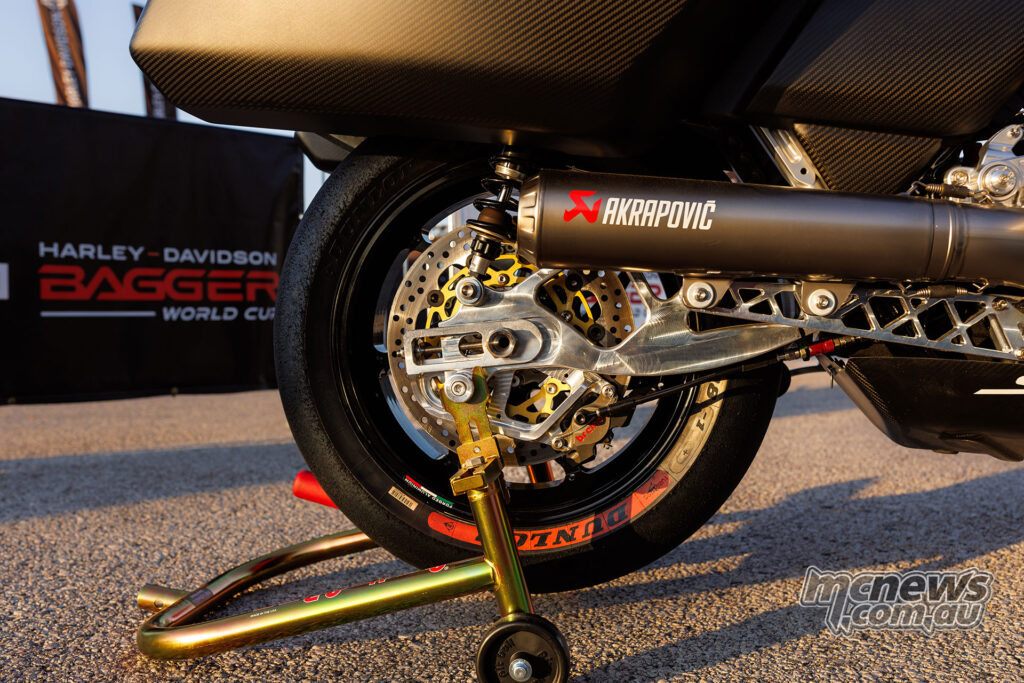 Rear brake assembly on a Harley-Davidson Bagger World Cup Road Glide race bike.