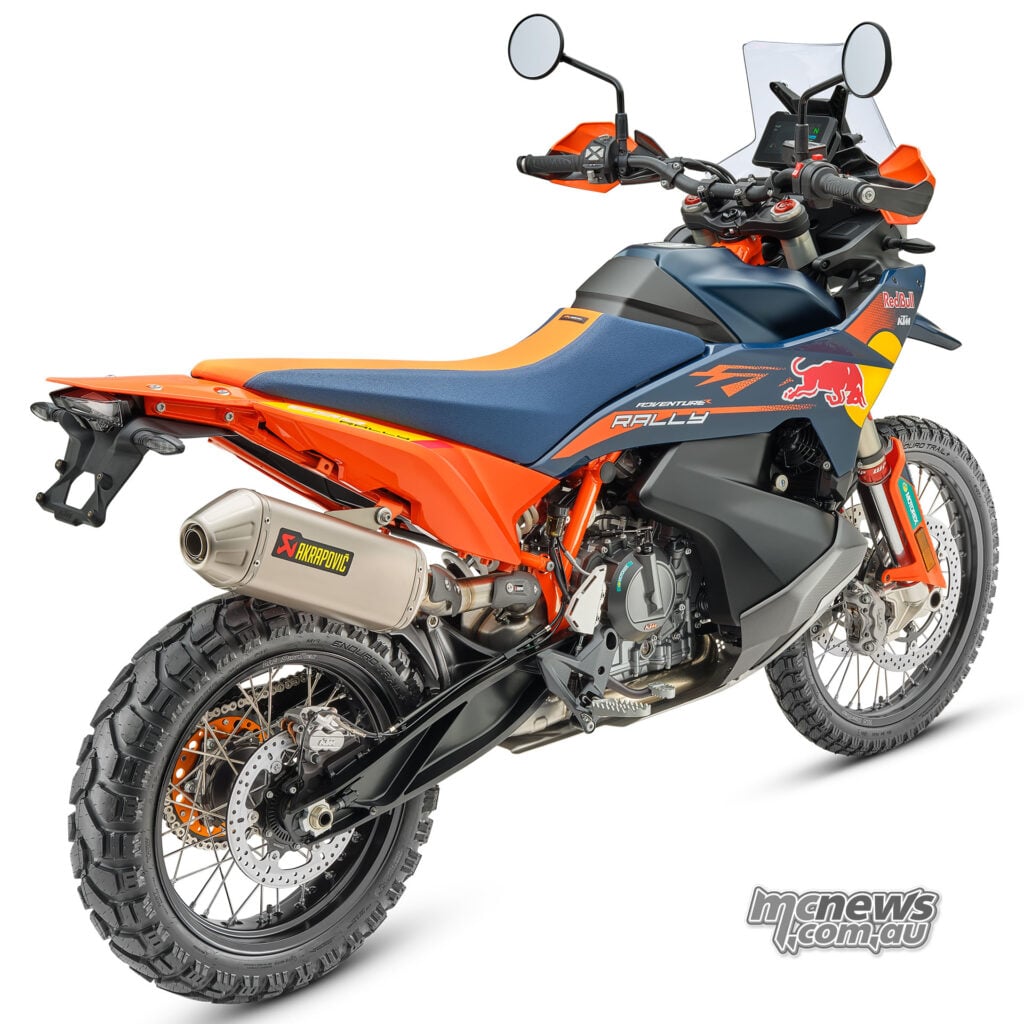 2026 KTM 890 Adventure R Rally rear three-quarter studio view with Akrapovic exhaust and rally bodywork