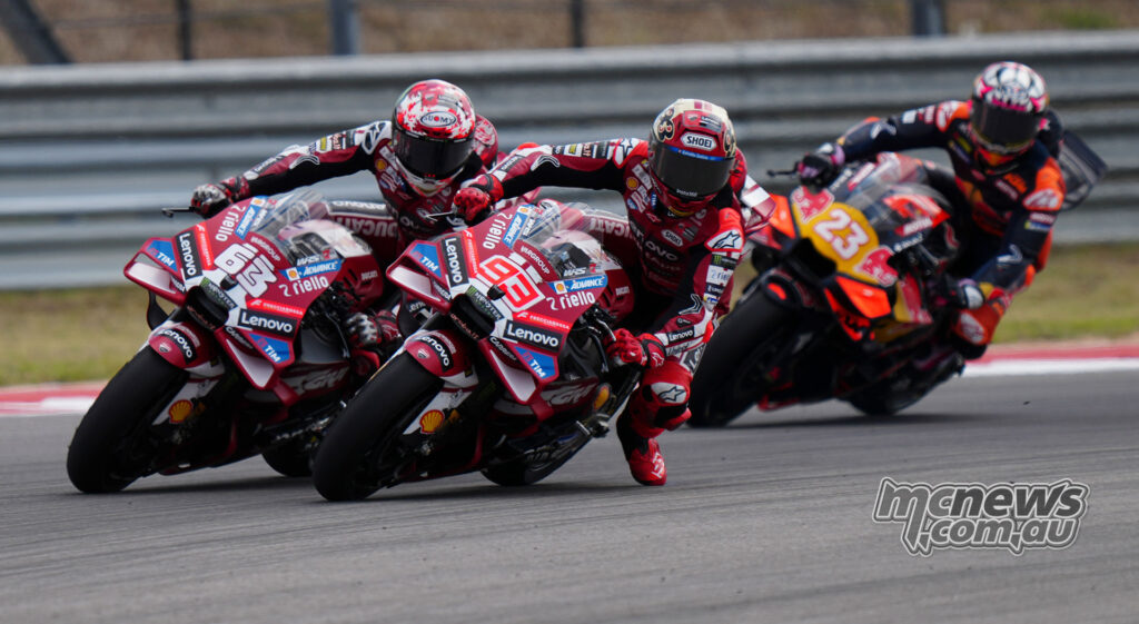 Marc Marquez and Francesco Bagnaia race ahead of Enea Bastianini during the MotoGP round at COTA.