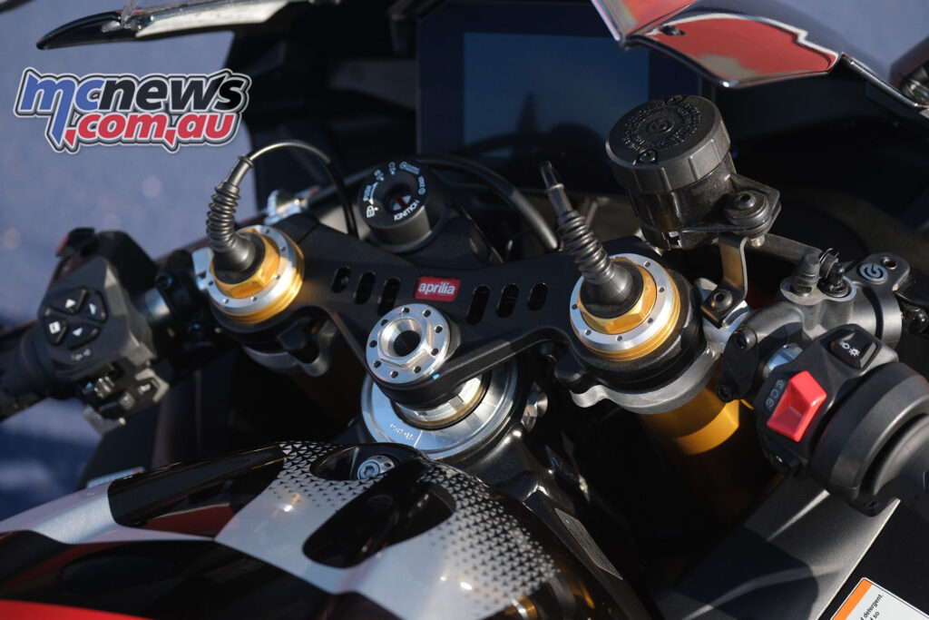 Aprilia RSV4 Factory 1100 cockpit showing TFT dash and rider controls