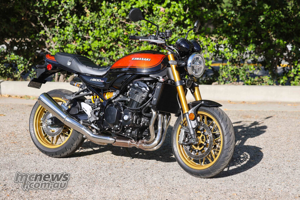 2026 Kawasaki Z900RS SE static three-quarter view showing orange and black paint