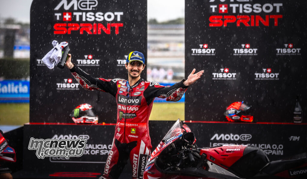 Francesco Bagnaia celebrates second place on the MotoGP Sprint podium at Jerez.
