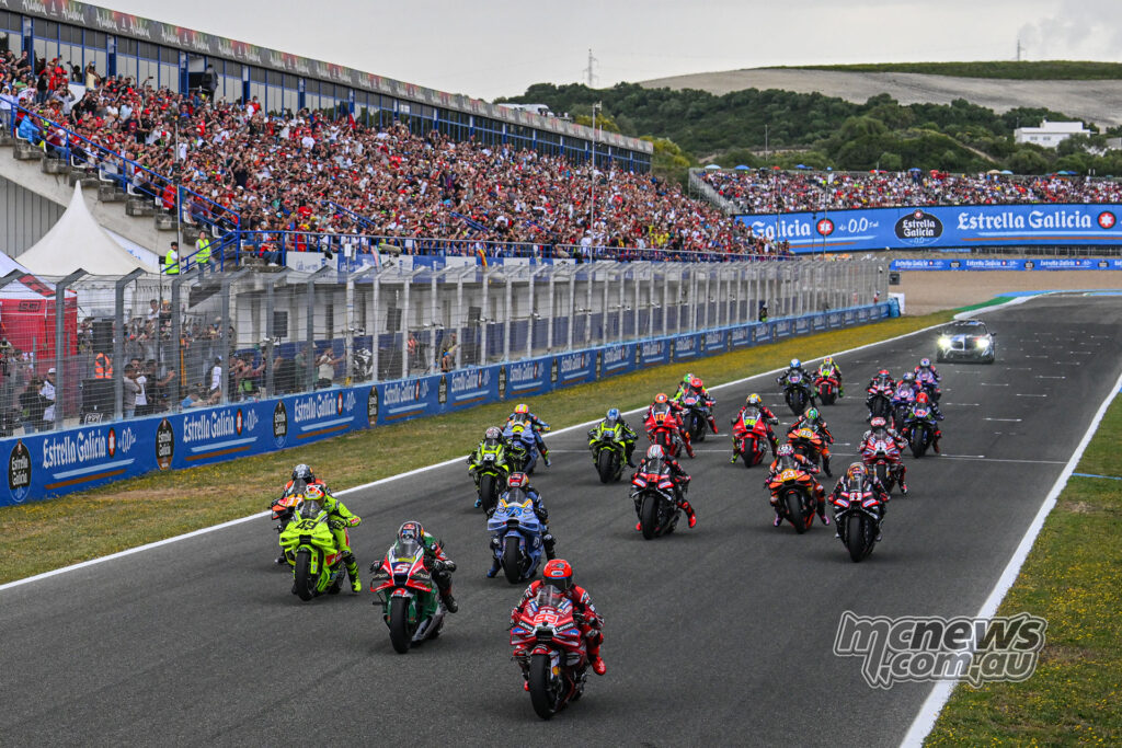 Marc Márquez leads the MotoGP field away from the start at Jerez.