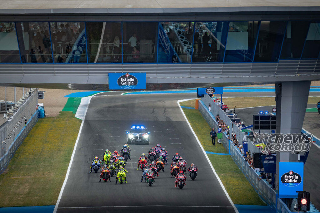 Wide view of the MotoGP Sprint start at Jerez with the full field launching away.