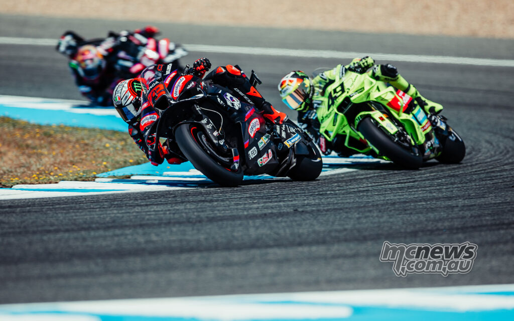 Marco Bezzecchi on the Aprilia leads Fabio Di Giannantonio and Jorge Martin through a Jerez corner during the race.