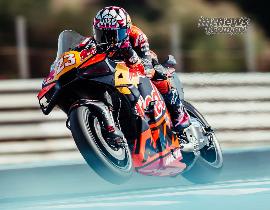Enea Bastianini lifting the front wheel of the KTM RC16 while accelerating at Jerez.