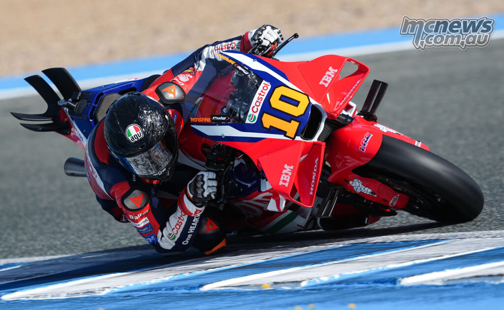 Luca Marini leans hard through a right-hander on the Honda RC213V at Jerez.