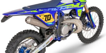Exhaust detail on a 2026 Sherco EnduroGP Replica motorcycle showing Akrapovič branding and factory-style finish.