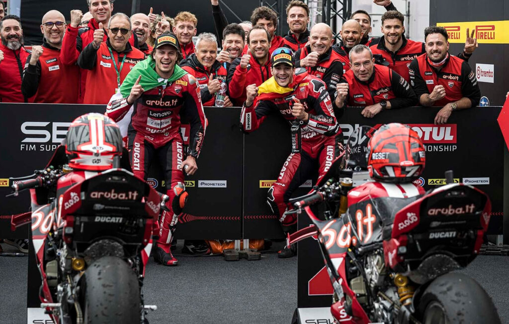 Nicolò Bulega, Iker Lecuona and the Aruba.it Ducati team celebrate in parc fermé after their one-two result in WorldSBK Race 1 at Assen.