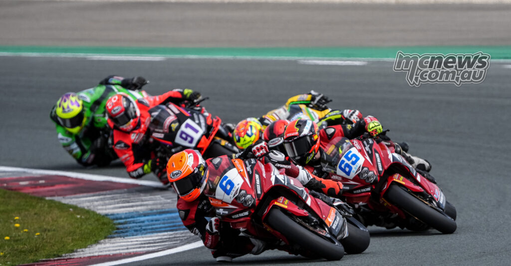 Jeffrey Buis and Ferre Fleerackers race wheel-to-wheel during World Sportbike Race 1 at Assen.
