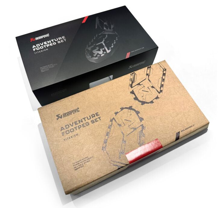 Akrapovič Adventure Footpeg Set titanium packaging boxes.