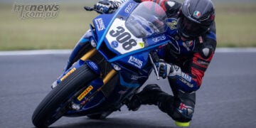 John Lytras rides the green number 308 Yamaha YZF-R1 through Morgan Park during ASBK Superbike practice.