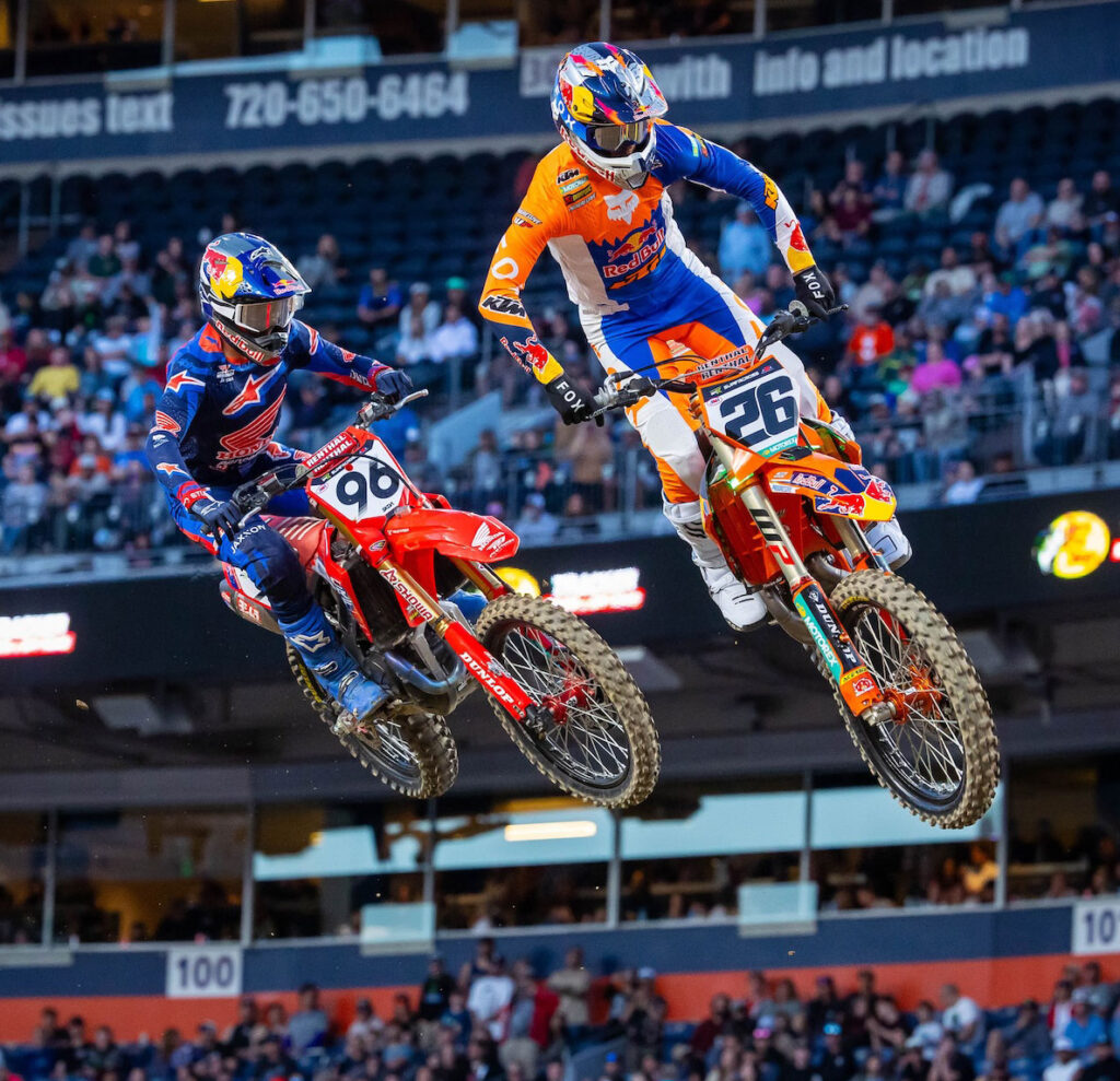 Jorge Prado leading Hunter Lawrence during the opening stages of the Denver 450SX Main Event.