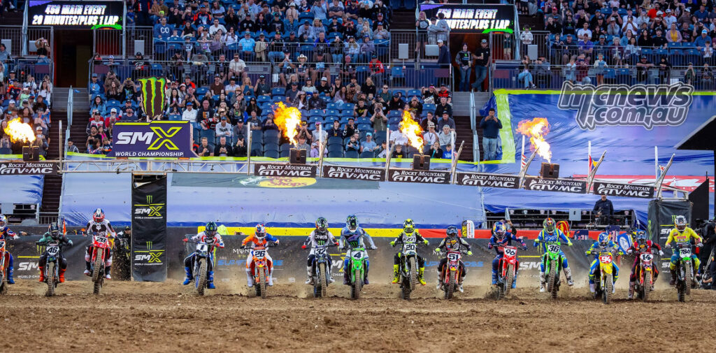 Full 450SX field leaving the start gate at Denver Supercross 2026.
