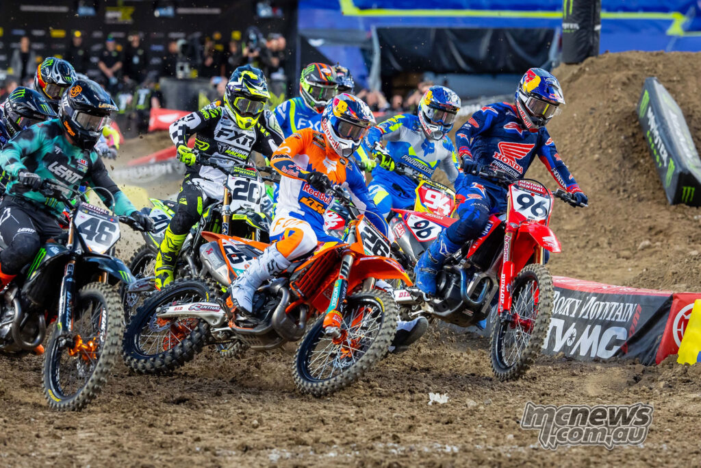 Jorge Prado and Hunter Lawrence among the front runners through the first turns of the Denver 450SX Main Event.