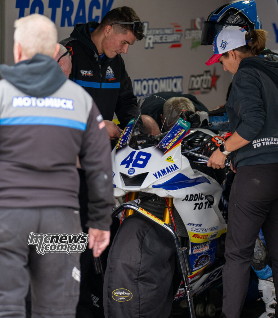 Valentino Knezovic’s Yamaha being repaired after a warm-up lap crash before Supersport Race Two at The Bend