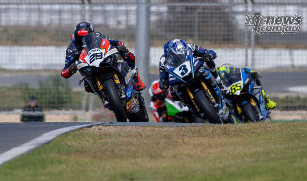 Harrison Voight leads Cam Dunker and Cru Halliday late in ASBK Superbike Race One