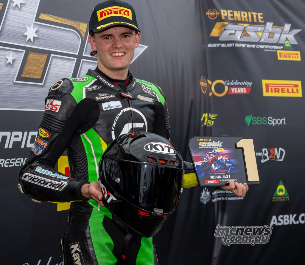 Hayden Nelson celebrates after winning ASBK Supersport Next Gen Race Two at The Bend