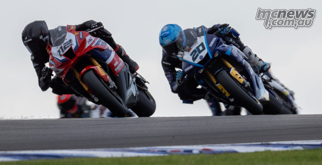 Jacob Roulstone and Jonathan Nahlous battling during ASBK Superbike Race Two at The Bend