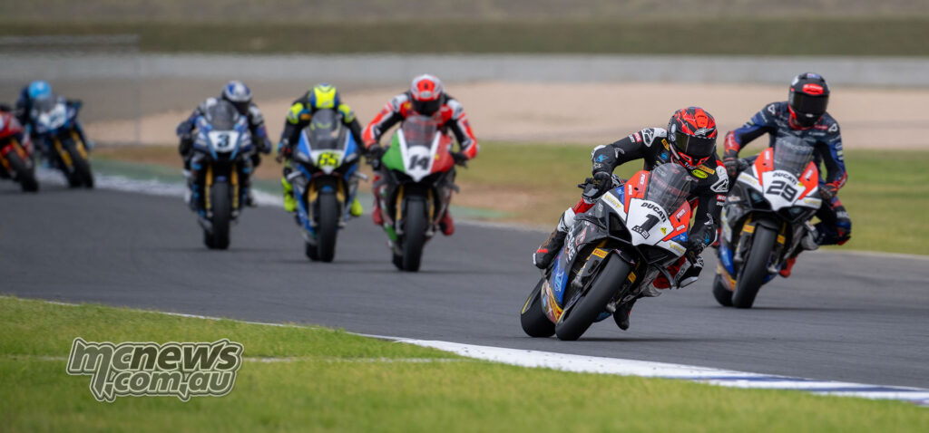 Josh Waters leads Harrison Voight during ASBK Superbike Race Two at The Bend