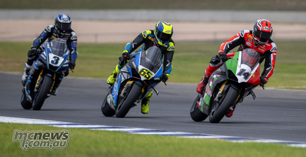 Glenn Allerton, Cru Halliday and Cam Dunker battling in Superbike Race Two at The Bend