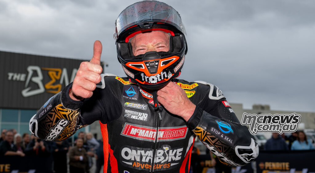 Josh Waters celebrates after winning ASBK Superbike Race Two at The Bend