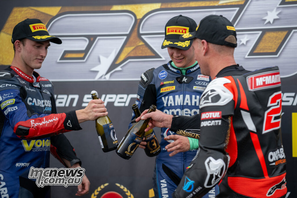 Jonathan Nahlous, Josh Waters and Harrison Voight celebrating on the ASBK Superbike podium at The Bend