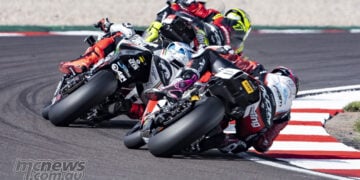 Kyle Ryde leading Scott Redding and Max Cook through Donington Park during the 2026 British Superbike round.