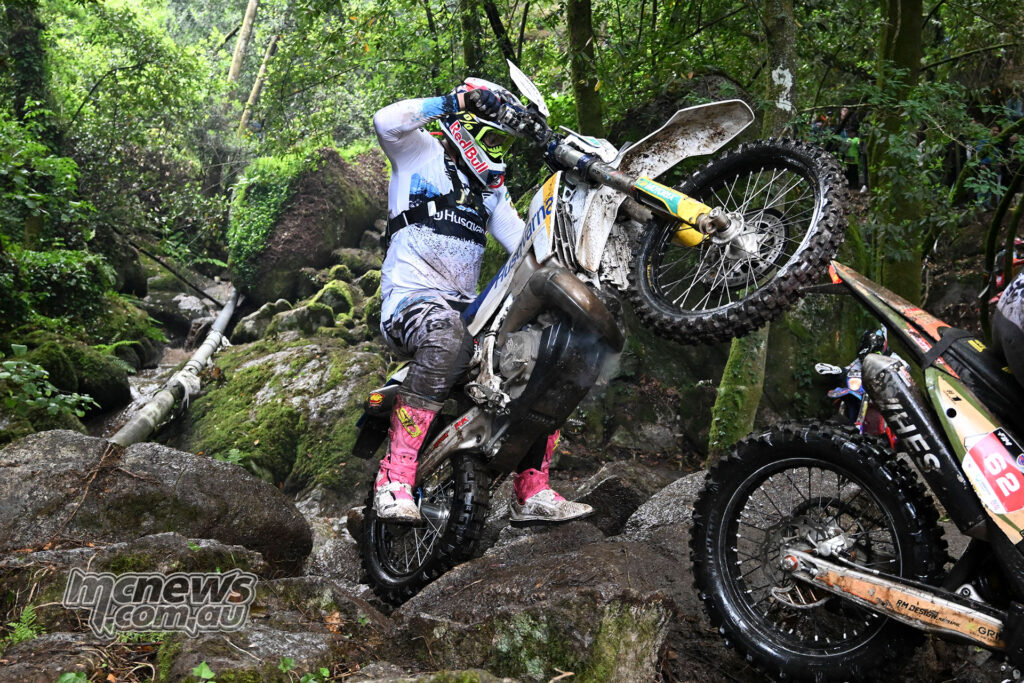 Billy Bolt pivots his Husqvarna through wet rocks during the 2026 Extreme XL Lagares.