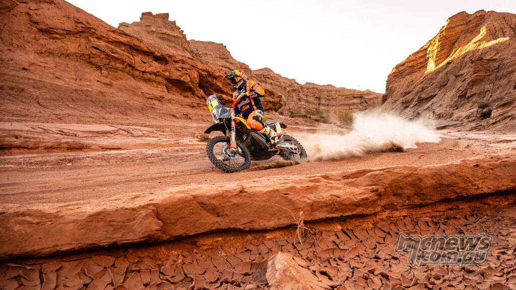 Daniel Sanders rides his Red Bull KTM rally bike through a dry rocky section during the 2026 Desafío Ruta 40.