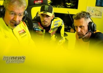 Fabio Di Giannantonio studies data with the Pertamina Enduro VR46 Racing Team at Le Mans.