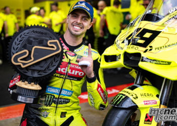 Fabio Di Giannantonio poses with the MotoGP winner’s trophy beside his VR46 Ducati.