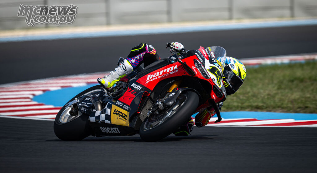 Alvaro Bautista leans the Barni Spark Ducati Panigale V4 R through a left-hander at Balaton Park.