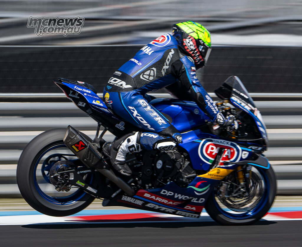 Remy Gardner brakes hard on the GYTR GRT Yamaha R1 with the rear wheel lifting at Balaton Park.
