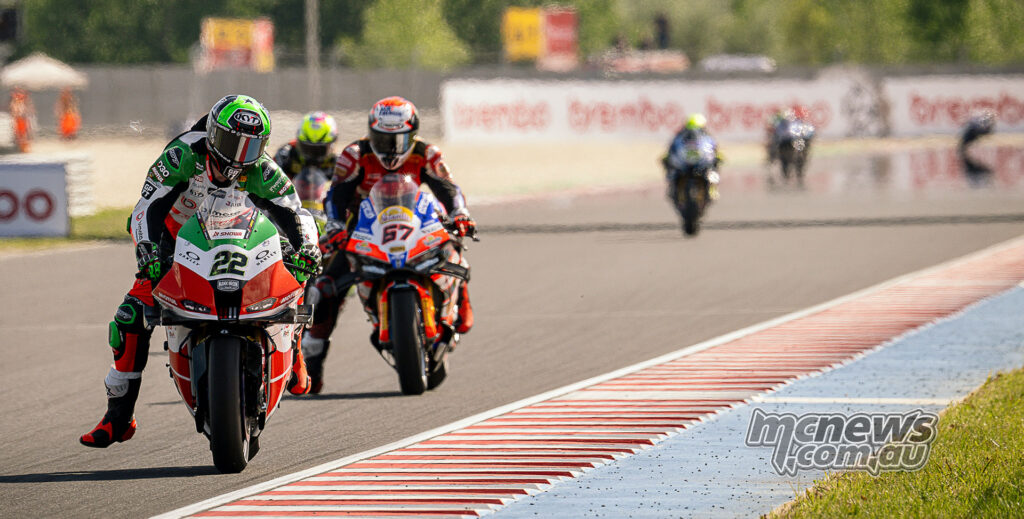 Alex Lowes leads a group during WorldSBK Race 1 at Balaton Park on the bimota KB998 Rimini.