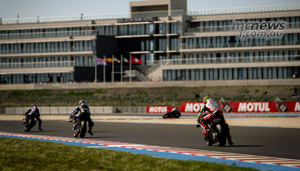 Axel Bassani brakes for a right-hander on the bimota KB998 Rimini during WorldSBK Race 1 at Balaton Park.
