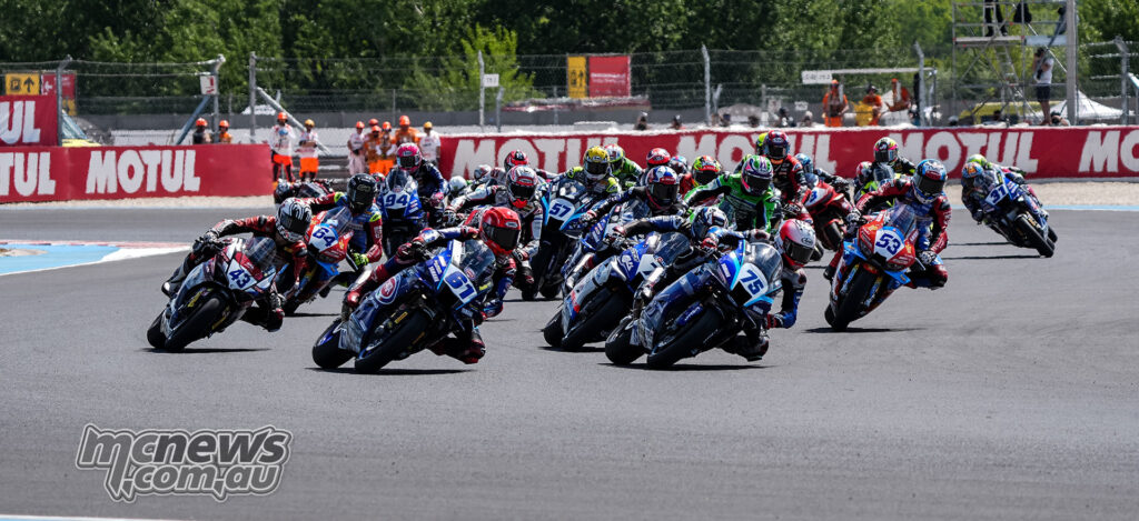 WorldSSP riders lean into the first corners at the start of Race 1 at Balaton Park.