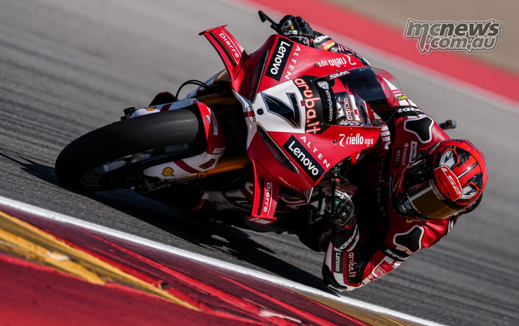 Iker Lecuona leaning the Aruba.it Racing Ducati Panigale V4R through a left-hand bend at Aragon.