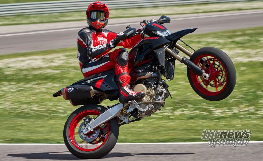 Ducati Hypermotard 698 Mono Nera lifting the front wheel on track