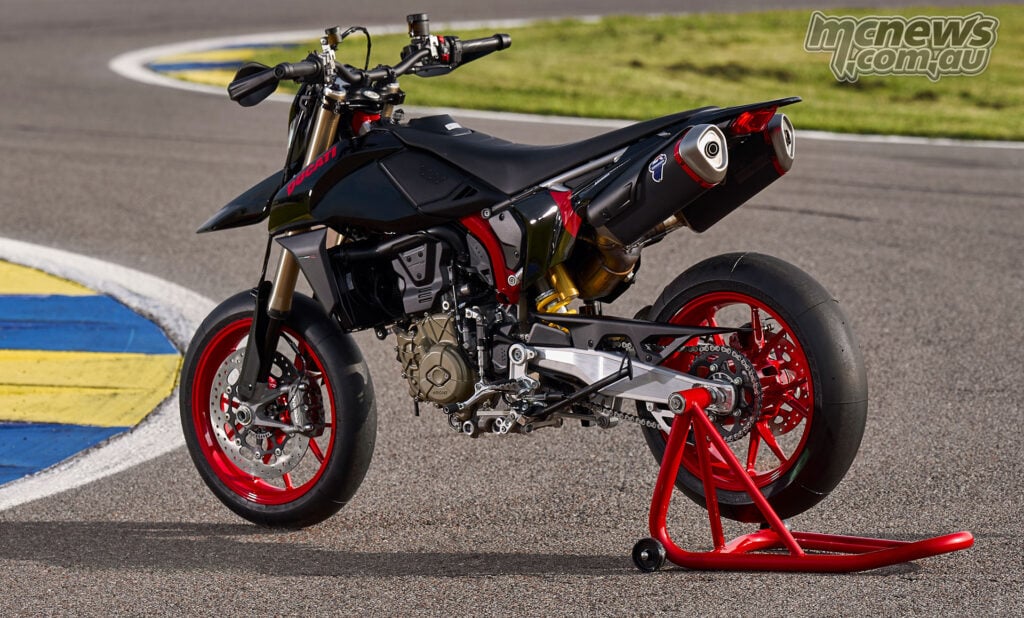 Ducati Hypermotard 698 Mono Nera rear three-quarter view beside a track ripple strip