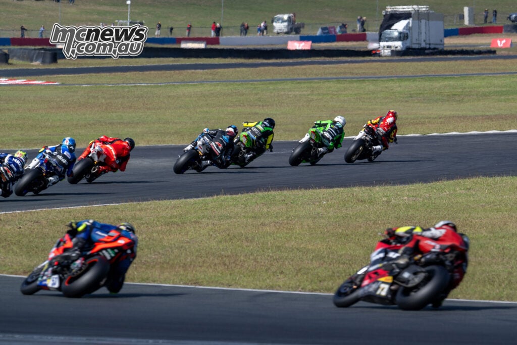 Olly Simpson leading the Supersport / Next Gen pack through Queensland Raceway.