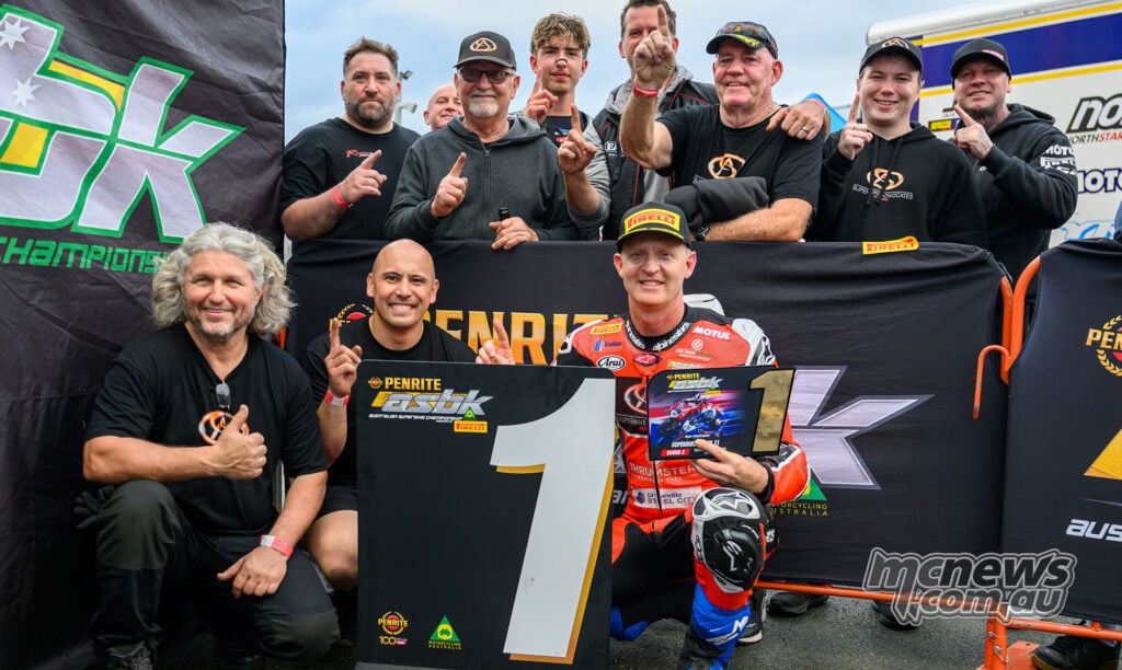 Glenn Allerton and the Superbike Advocates Racing crew celebrating victory at Queensland Raceway.