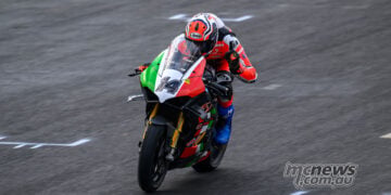 Glenn Allerton crossing the finish line to win wet ASBK Superbike Race Two.