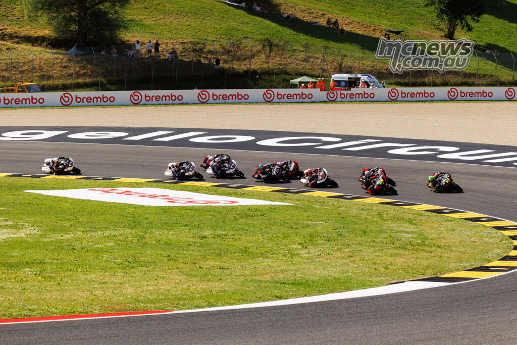 Bagger World Cup field racing through the opening turns at Mugello in Race Two.